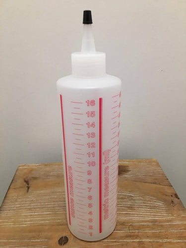 Dispensing Bottle With Mls. AND Ounce Markings With Dispensing Cap